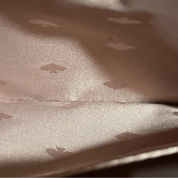 Small Kate Spade White and Pink Satchel with Brown Accents. - Picture 13 of 15